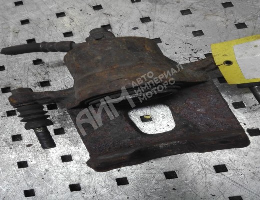 Суппорт передний левый Nissan Primera I (P10) 1990-1997  Nissan Primera Primera I (P10) 1990-1997