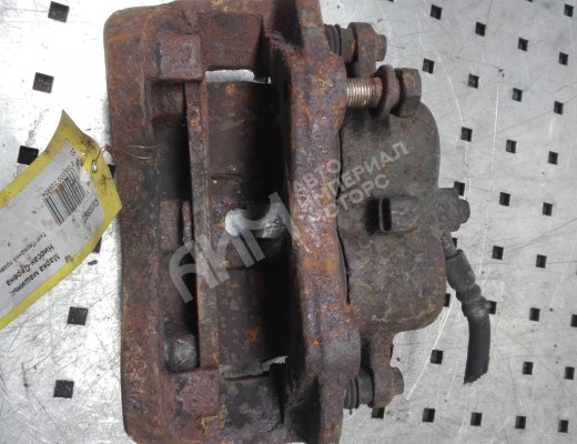 Суппорт передний правый Nissan Serena (C23) 1991-2001  Nissan Serena Serena (C23) 1991-2001