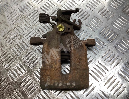 Суппорт задний левый Volvo V40 I (VW) 1995-2000  Volvo V40 V40 I (VW) 1995-2000