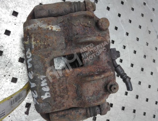 Суппорт передний левый Nissan Serena (C23) 1991-2001  Nissan Serena Serena (C23) 1991-2001