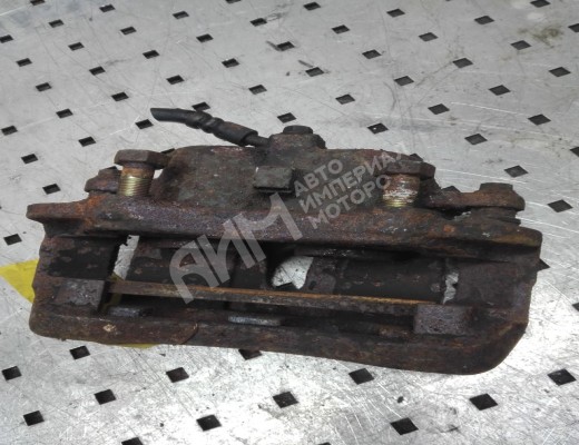Суппорт передний левый Nissan Serena (C23) 1991-2001  Nissan Serena Serena (C23) 1991-2001