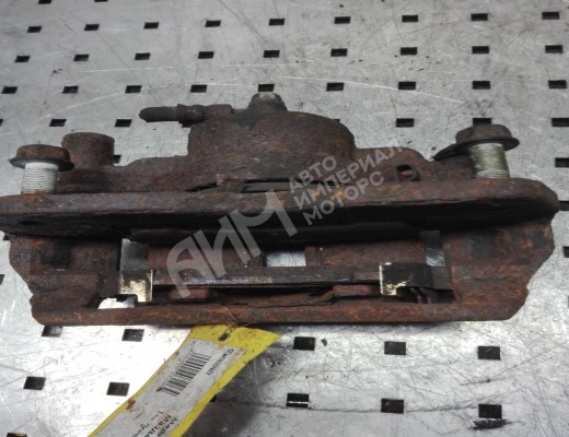 Суппорт передний левый Mazda Xedos VI (TA) 1992-1999  Mazda Xedos Xedos VI (TA) 1992-1999