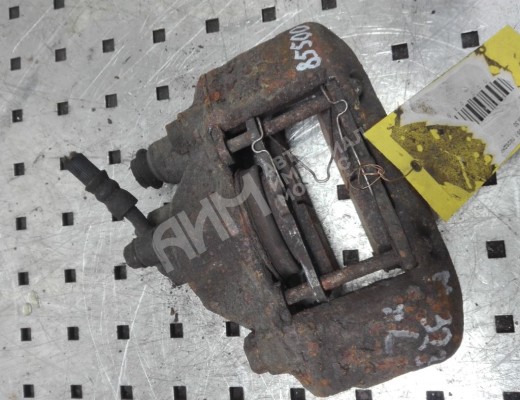 Суппорт передний левый Mazda Demio (DW) 1996-2002  Mazda Demio Demio (DW) 1996-2002