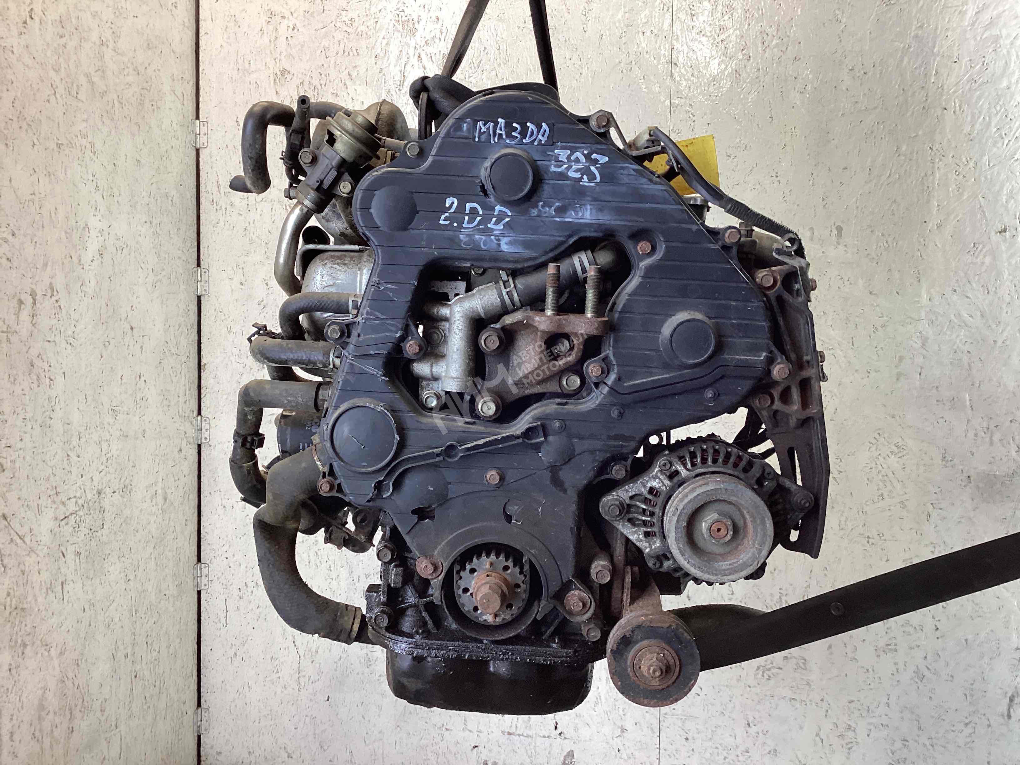 Двигатель  Mazda 323