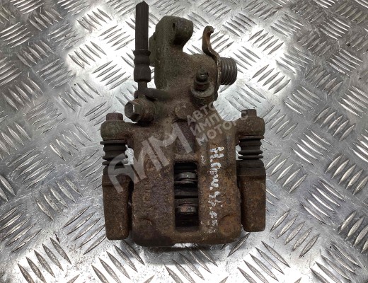 Суппорт задний правый Nissan Primera II (P11) 1996-2002  Nissan Primera Primera II (P11) 1996-2002