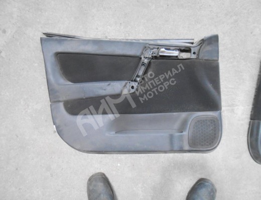 Обшивка двери передней левой (дверная карта) Opel Astra G 1998-2004  Opel Astra Astra G 1998-2004
