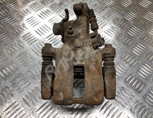 Суппорт задний левый Nissan Primera II (P11) 1996-2002  Nissan Primera Primera II (P11) 1996-2002