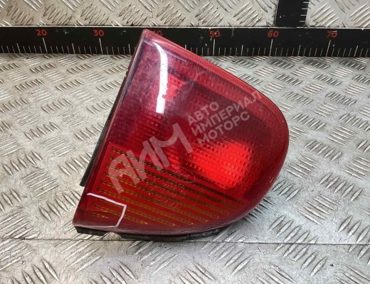 Фонарь крышки багажника левый Ford Escort V 1990-1995  Ford Escort Escort V 1990-1995