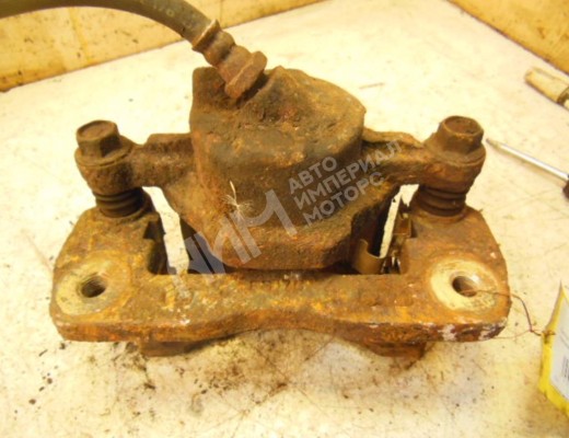 Суппорт передний левый Kia Clarus (K9A, GC) 1996-2001  Kia Clarus Clarus (K9A, GC) 1996-2001