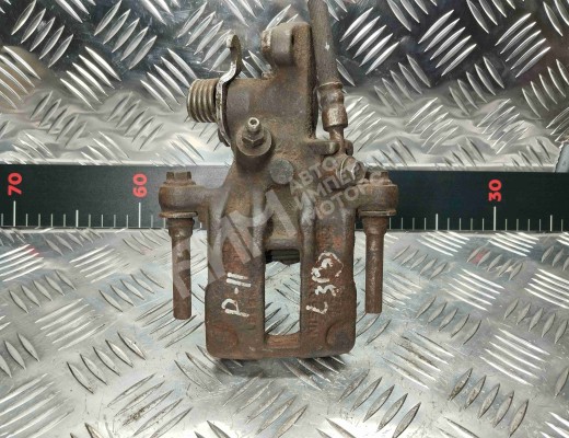 Суппорт задний левый Nissan Primera II (P11) 1996-2002  Nissan Primera Primera II (P11) 1996-2002