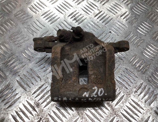 Суппорт задний левый Kia Carnival II (VQ) 2006-2014  Kia Carnival Carnival II (VQ) 2006-2014