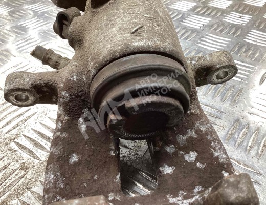 Суппорт задний левый Volkswagen Touran I (1T) 2003-2006  Volkswagen Touran Touran I (1T) 2003-2006