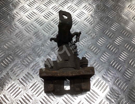 Суппорт задний правый Nissan Almera II (N16) 2000-2006  Nissan Almera Almera II (N16) 2000-2006