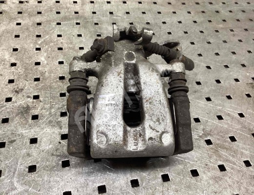 Суппорт задний левый Opel Astra H 2004-2007  Opel Astra Astra H 2004-2007