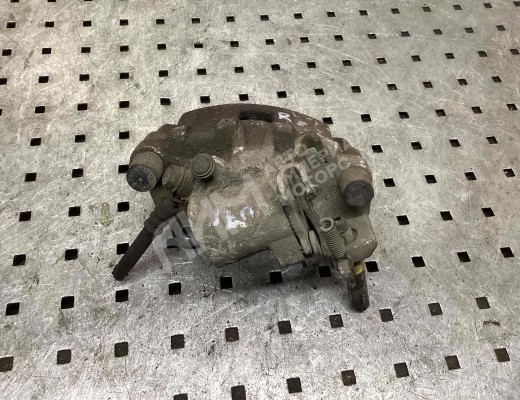 Суппорт задний правый Toyota Yaris II (XP90) 2005-2011  Toyota Yaris Yaris II (XP90) 2005-2011