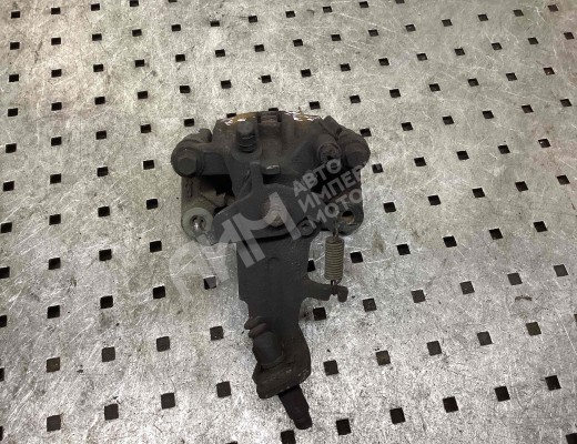 Суппорт задний правый Nissan Almera II (N16) 2000-2006  Nissan Almera Almera II (N16) 2000-2006