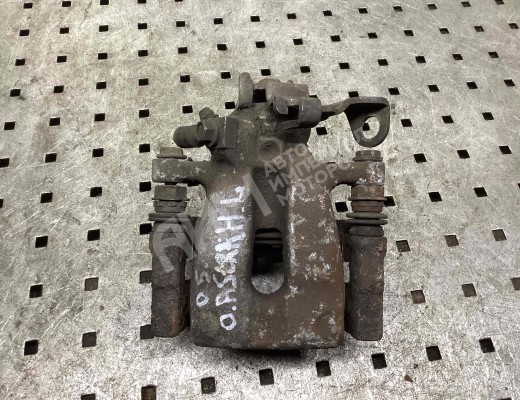 Суппорт задний левый Opel Astra H 2004-2007  Opel Astra Astra H 2004-2007