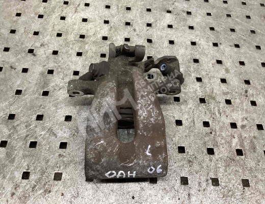 Суппорт задний левый Opel Astra H 2004-2007  Opel Astra Astra H 2004-2007