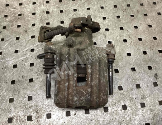 Суппорт задний левый Volkswagen Passat B5 (3B) 1996-2000  Volkswagen Passat Passat B5 (3B) 1996-2000