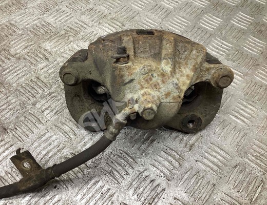 Суппорт передний левый Hyundai Sonata IV (EF) 2001-2004 рестайлинг  Hyundai Sonata Sonata IV (EF) 2001-2004 рестайлинг
