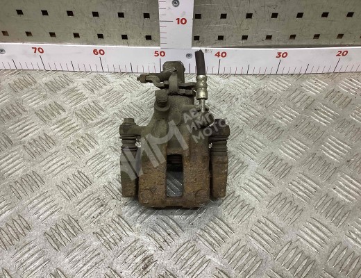 Суппорт задний левый Nissan Almera II (N16) 2000-2006  Nissan Almera Almera II (N16) 2000-2006