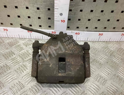 Суппорт передний правый Nissan Almera II (N16) 2000-2006  Nissan Almera Almera II (N16) 2000-2006