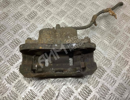 Суппорт передний левый Kia Carnival II (VQ) 2006-2014  Kia Carnival Carnival II (VQ) 2006-2014