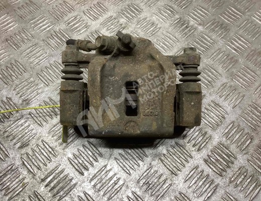 Суппорт задний левый Kia Carnival II (VQ) 2006-2014  Kia Carnival Carnival II (VQ) 2006-2014