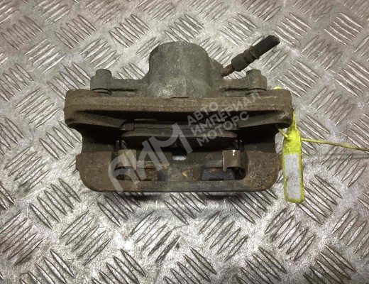 Суппорт задний левый Kia Carnival II (VQ) 2006-2014  Kia Carnival Carnival II (VQ) 2006-2014