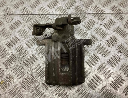 Суппорт задний левый Volkswagen Passat B5 (3B) 1996-2000  Volkswagen Passat Passat B5 (3B) 1996-2000