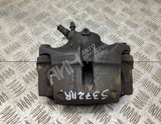 Суппорт передний правый Renault Kangoo I 2003-2007 рестайлинг  Renault Kangoo Kangoo I 2003-2007 рестайлинг