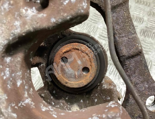 Суппорт задний левый Renault Laguna II (X74) 2001-2005  Renault Laguna Laguna II (X74) 2001-2005