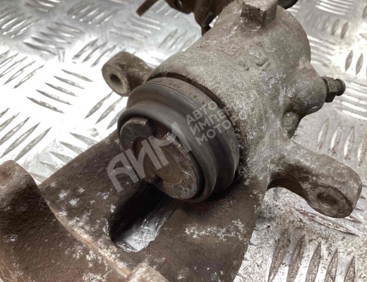 Суппорт задний левый Opel Astra H 2004-2007  Opel Astra Astra H 2004-2007