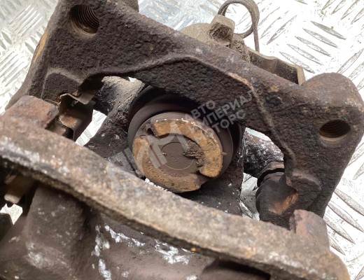 Суппорт задний правый Opel Astra H 2007-2010 рестайлинг  Opel Astra Astra H 2007-2010 рестайлинг