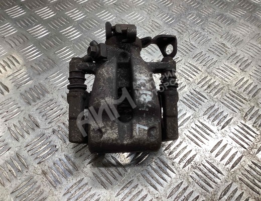 Суппорт задний левый Opel Astra H 2007-2010 рестайлинг  Opel Astra Astra H 2007-2010 рестайлинг