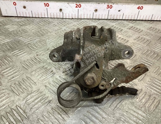 Суппорт задний левый Volkswagen Passat B5 (3B) 1996-2000  Volkswagen Passat Passat B5 (3B) 1996-2000