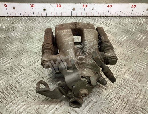 Суппорт задний левый Opel Astra H 2007-2010 рестайлинг  Opel Astra Astra H 2007-2010 рестайлинг
