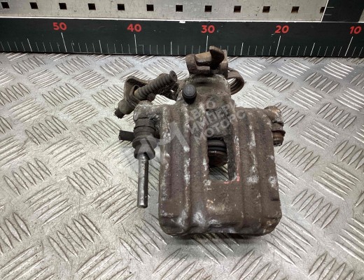 Суппорт задний левый Volkswagen Passat B5 (3B) 1996-2000  Volkswagen Passat Passat B5 (3B) 1996-2000