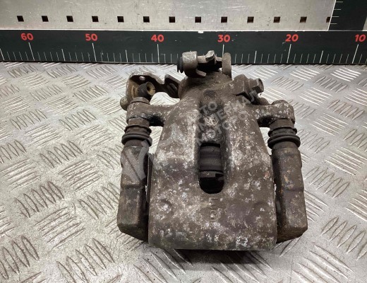 Суппорт задний правый Opel Astra H 2007-2010 рестайлинг  Opel Astra Astra H 2007-2010 рестайлинг