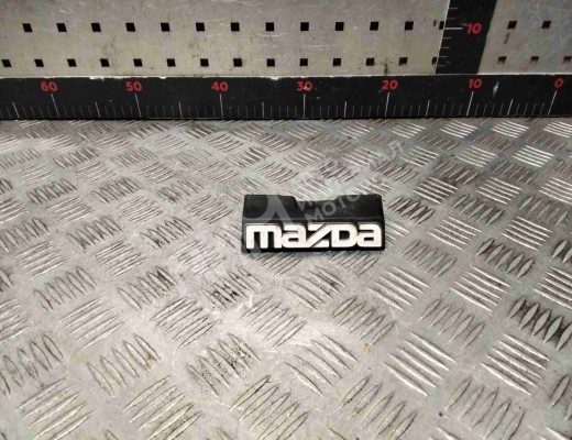 Эмблема Mazda 323F I (BG) 1989-1994  Mazda 323F 323F I (BG) 1989-1994