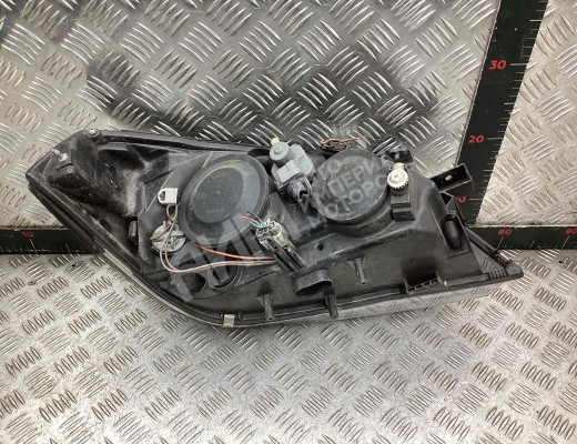 Фара левая Nissan Primera III (P12) 2002-2008  Nissan Primera Primera III (P12) 2002-2008