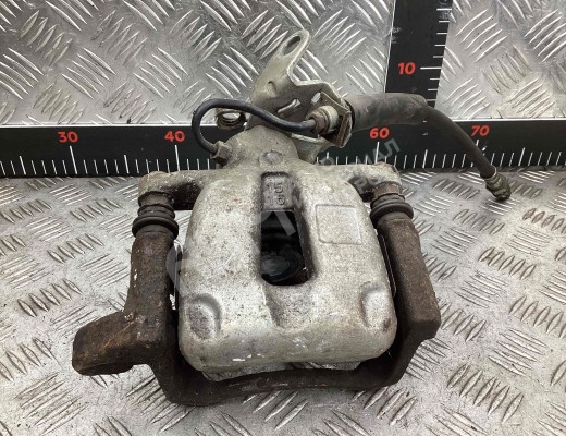 Суппорт задний левый Volkswagen Touran I (1T) 2003-2006  Volkswagen Touran Touran I (1T) 2003-2006