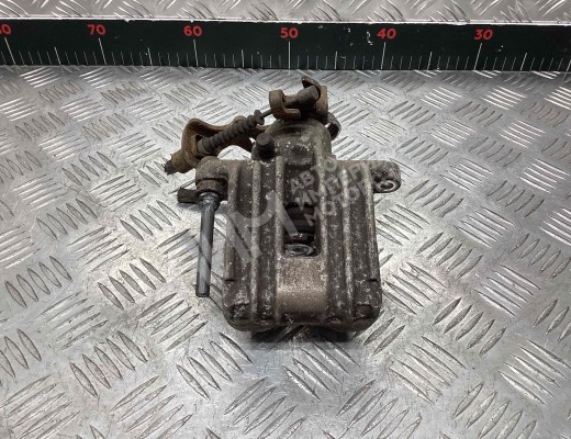 Суппорт задний левый Volkswagen Passat B5 (3B) 1996-2000  Volkswagen Passat Passat B5 (3B) 1996-2000