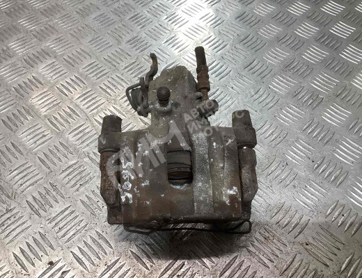 Суппорт задний левый Nissan Primera III (P12) 2002-2008  Nissan Primera Primera III (P12) 2002-2008