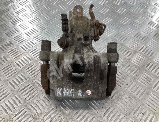 Суппорт задний правый Nissan Primera III (P12) 2002-2008  Nissan Primera Primera III (P12) 2002-2008