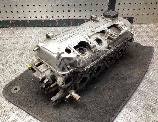 Головка блока цилиндров Mitsubishi Carisma (DA) 1995-2004  Mitsubishi Carisma Carisma (DA) 1995-2004